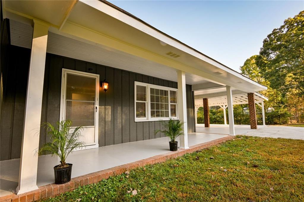 8196 Lakeview Drive Southwest Covington, GA 30014 - Photo 3 of 51 a front view of a house with a yard