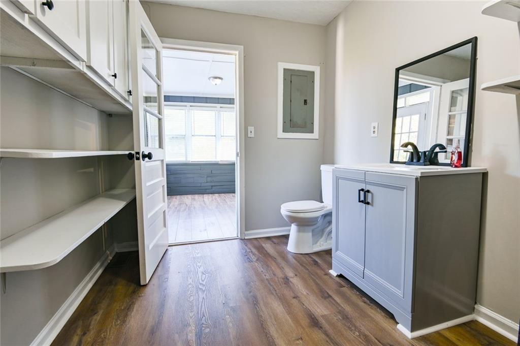 8196 Lakeview Drive Southwest Covington, GA 30014 - Photo 32 of 51 a bathroom with a sink a toilet and shower