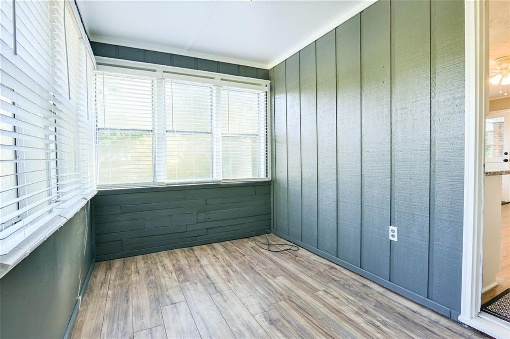 8196 Lakeview Drive Southwest Covington, GA 30014 - Photo 35 of 51 a room with a window and a wooden floor