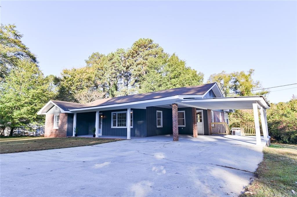 8196 Lakeview Drive Southwest Covington, GA 30014 - Photo 40 of 51 front view of a house with a yard