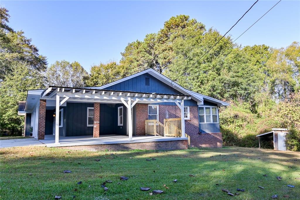 8196 Lakeview Drive Southwest Covington, GA 30014 - Photo 42 of 51 a view of a house with a yard