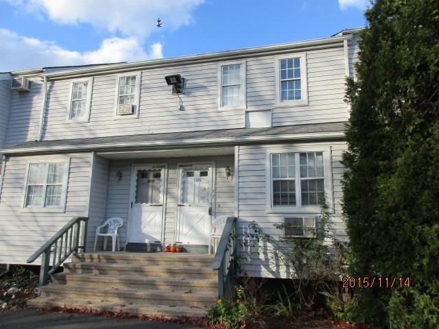 14 Scuppo Road, Unit F4 Danbury, CT 06811 - Photo 1 of 1 a front view of a house with balcony
