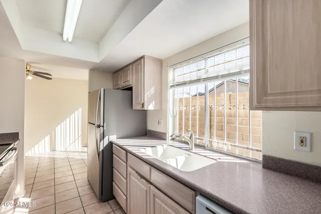 a kitchen that has a stove and a refrigerator