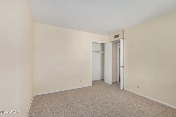 a view of a room with rack on the wall