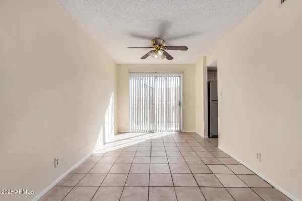 a view of an empty room and window
