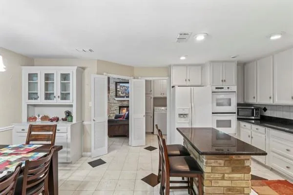 a workspace with furniture and wooden floor