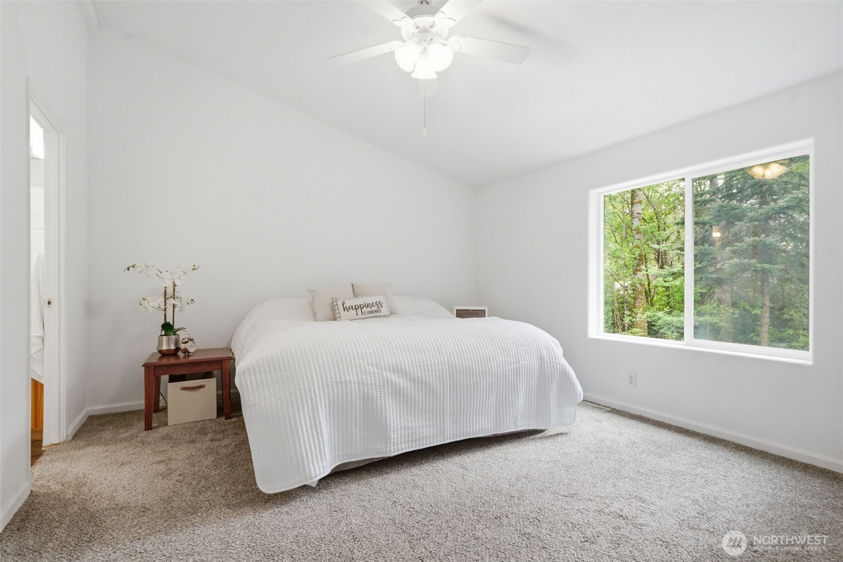 71 East Richardson Road Belfair, WA 98528 - Photo 11 of 31 a spacious bedroom with a bed and a window