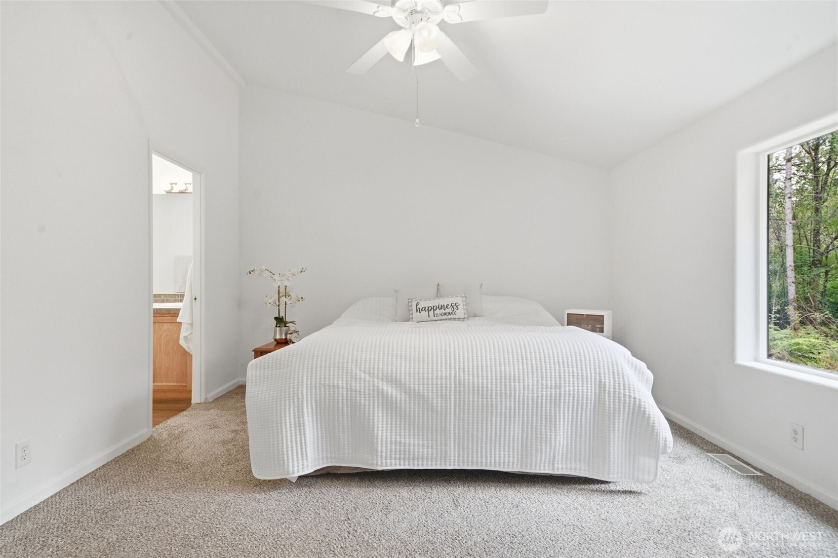 71 East Richardson Road Belfair, WA 98528 - Photo 12 of 31 a bedroom with a bed and a window