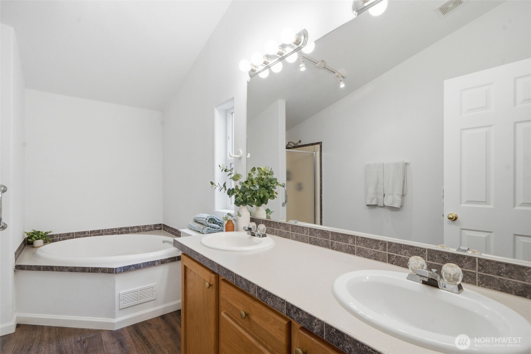 71 East Richardson Road Belfair, WA 98528 - Photo 13 of 31 a bathroom with a granite countertop sink a toilet and a mirror