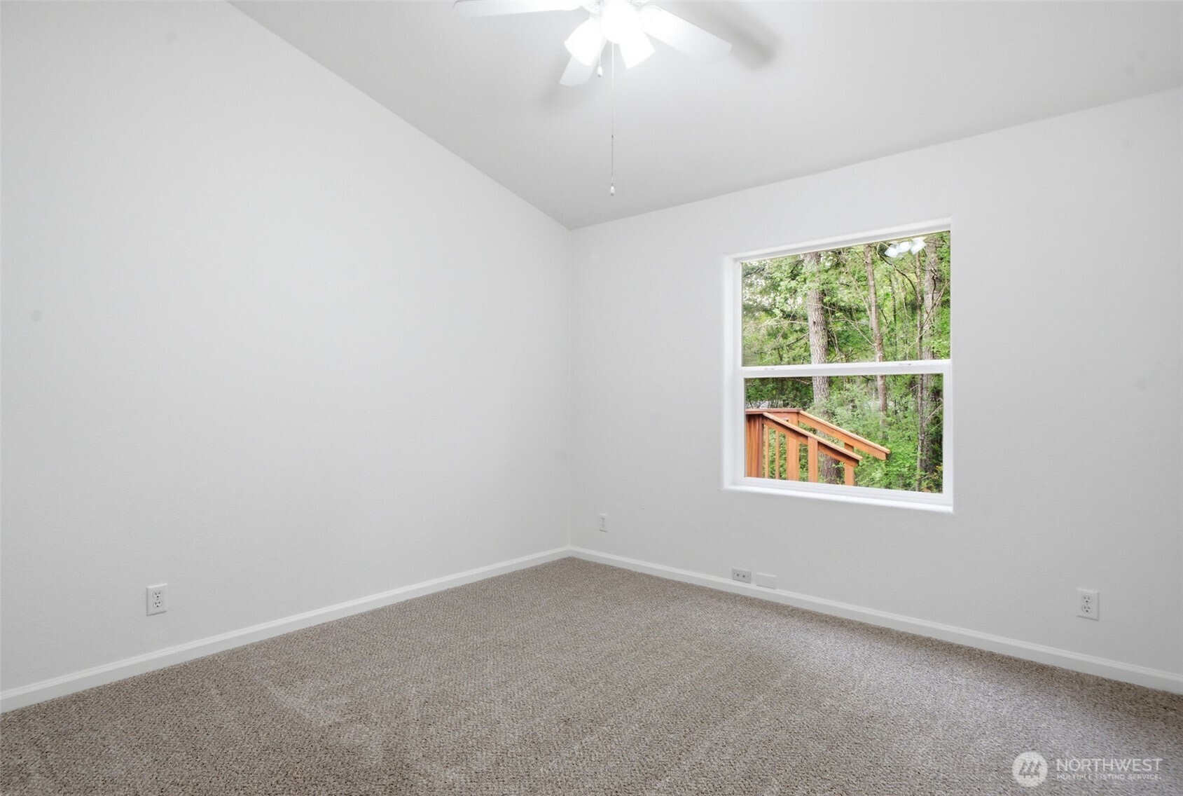 71 East Richardson Road Belfair, WA 98528 - Photo 17 of 31 an empty room with a window