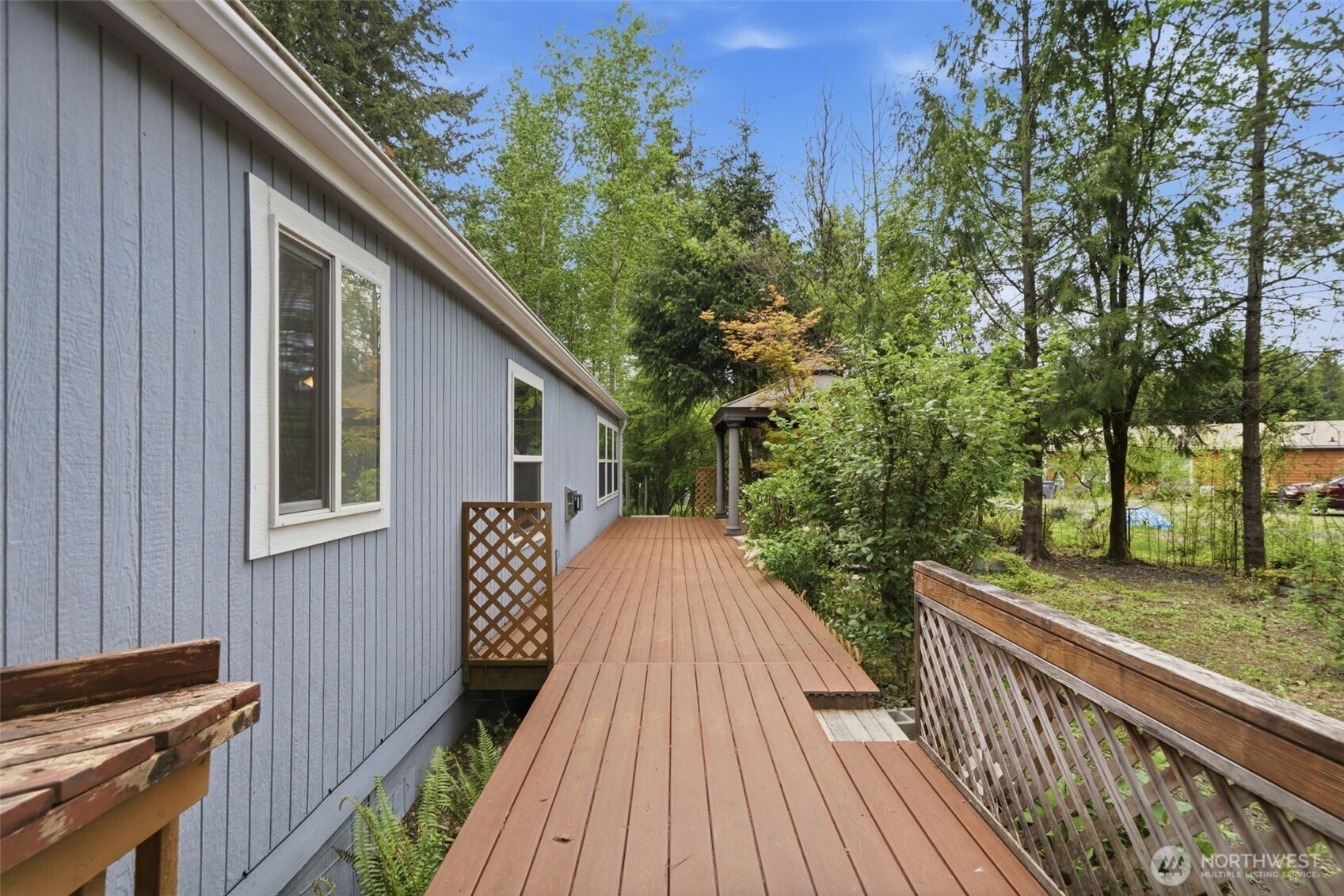 71 East Richardson Road Belfair, WA 98528 - Photo 23 of 31 a view of house with backyard outdoor seating
