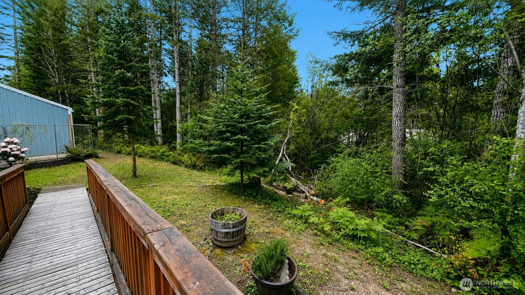 71 East Richardson Road Belfair, WA 98528 - Photo 5 of 31 a view of a backyard with sitting area