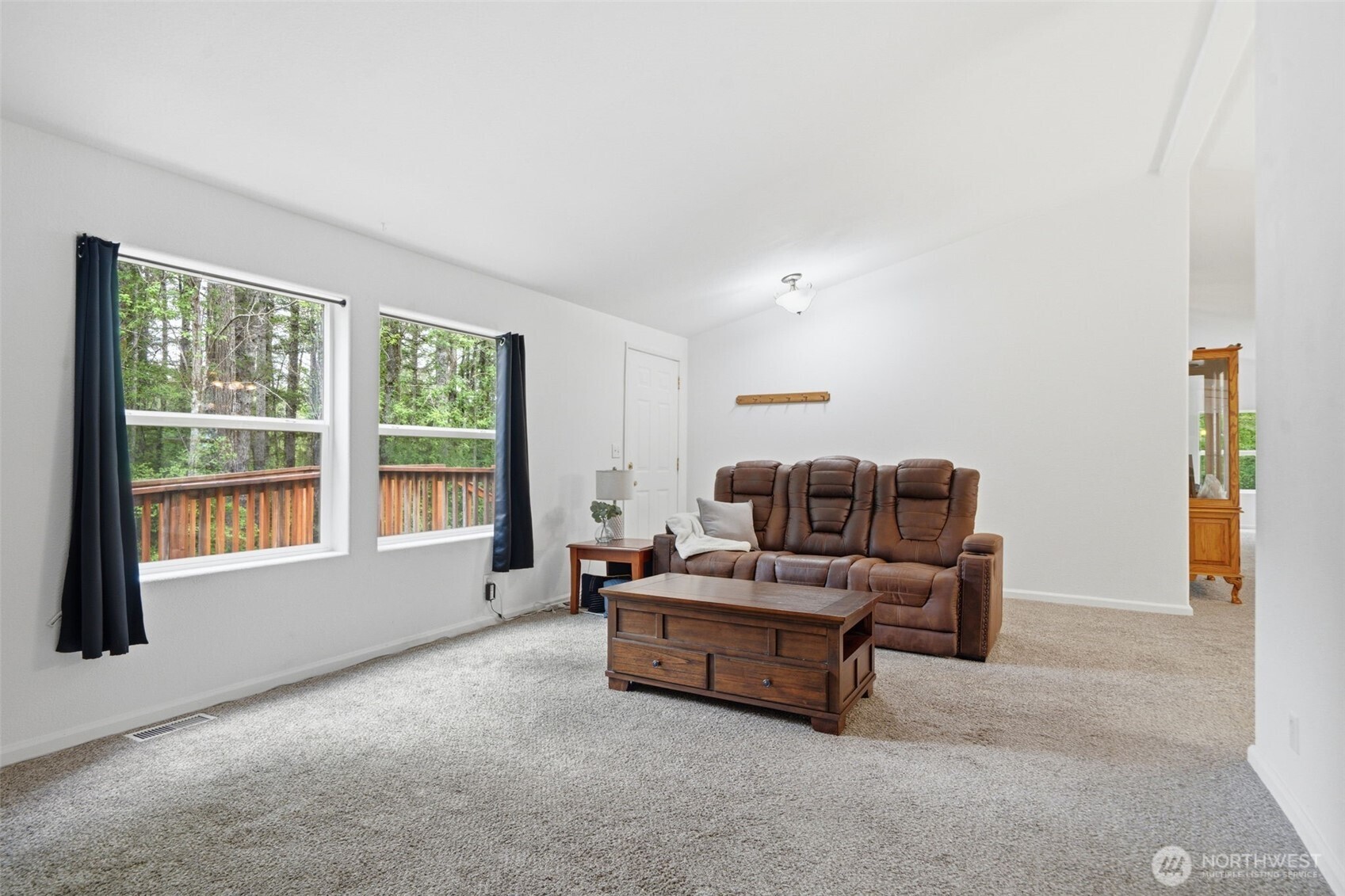 71 East Richardson Road Belfair, WA 98528 - Photo 10 of 31 a living room with furniture and a window