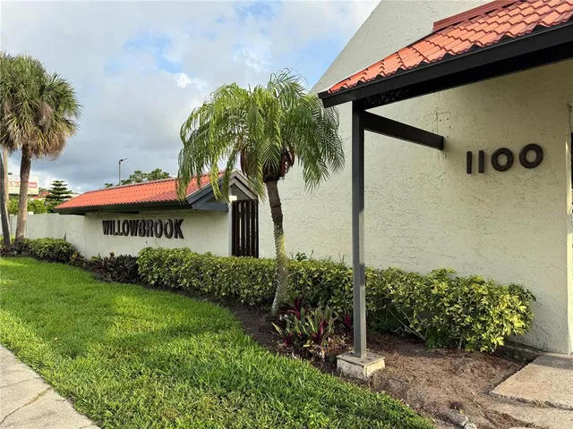 a house view with a backyard space