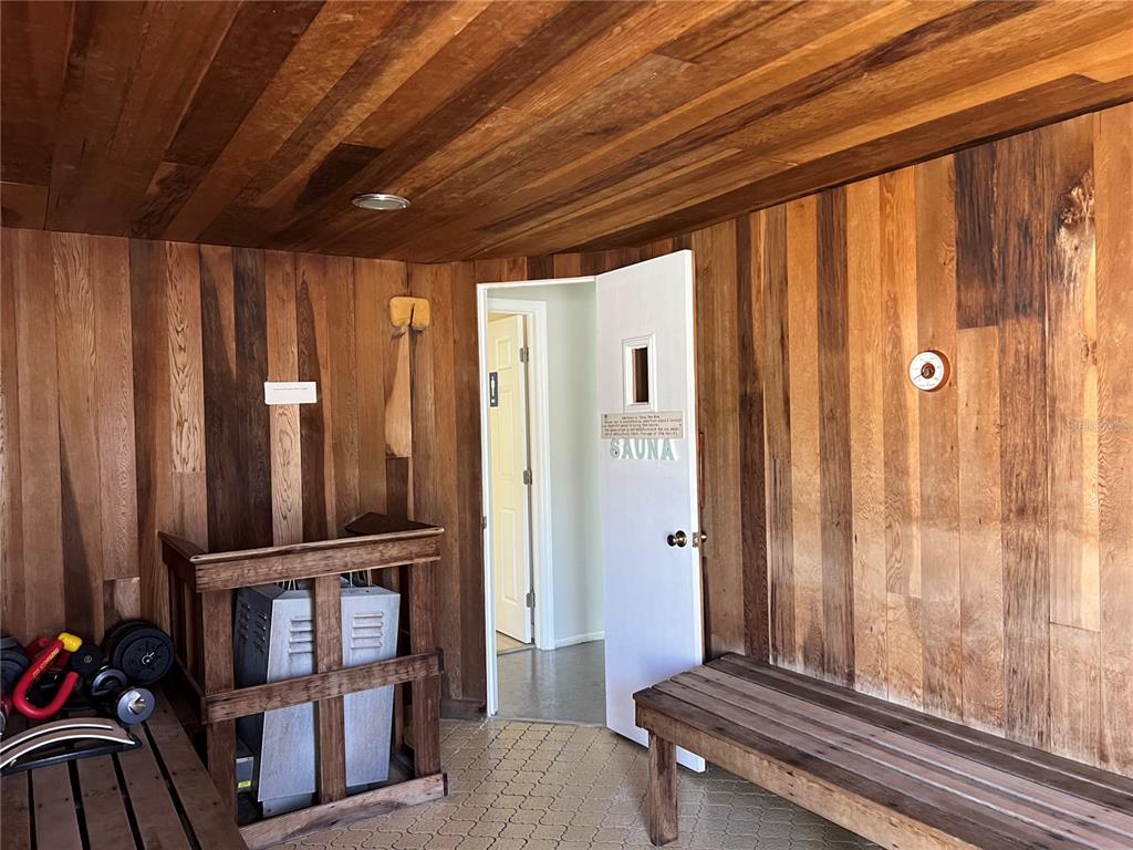 1100 East Bay Drive, Unit 35 Largo, FL 33770 - Photo 19 of 34 a view of a hallway with windows and stairs