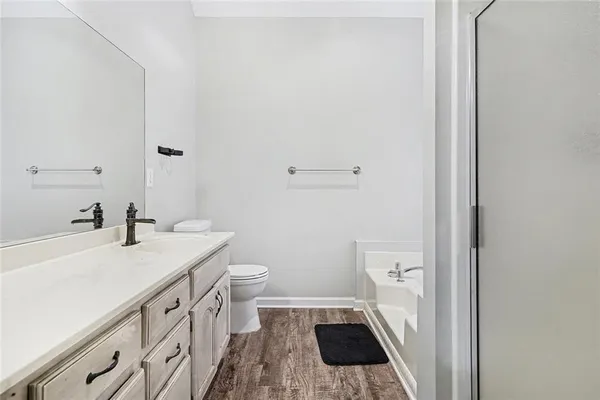 a white bath tub sitting next to a window
