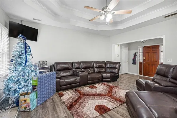 a living room with furniture and a couch