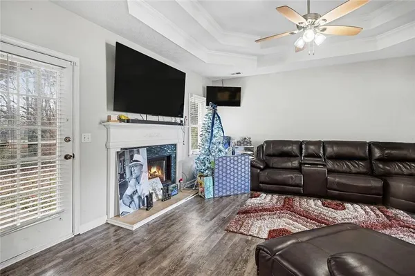 a kitchen with a refrigerator a stove and a sink