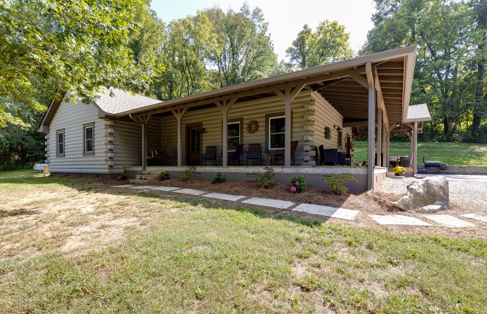 4520 Dugger Road Culleoka, TN 38451 - Photo 12 of 40 a backyard of a house with seating space
