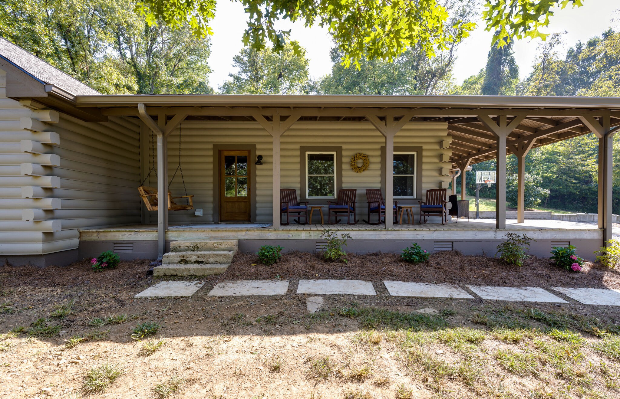 4520 Dugger Road Culleoka, TN 38451 - Photo 13 of 40 a view of a house with backyard tub and chairs