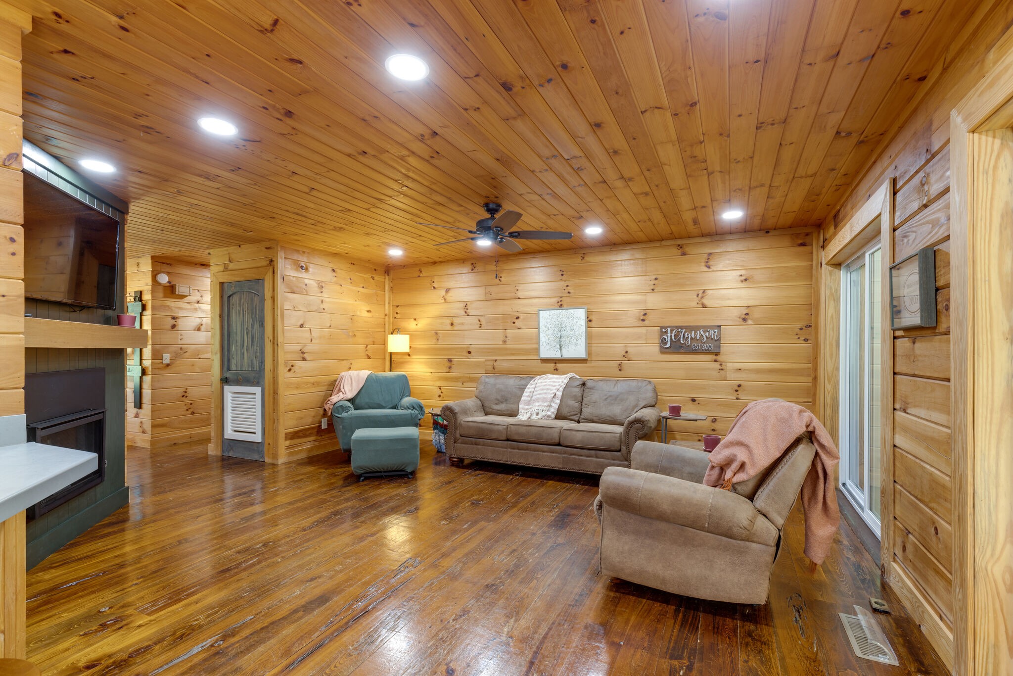 4520 Dugger Road Culleoka, TN 38451 - Photo 19 of 40 a living room with furniture and a wooden floor