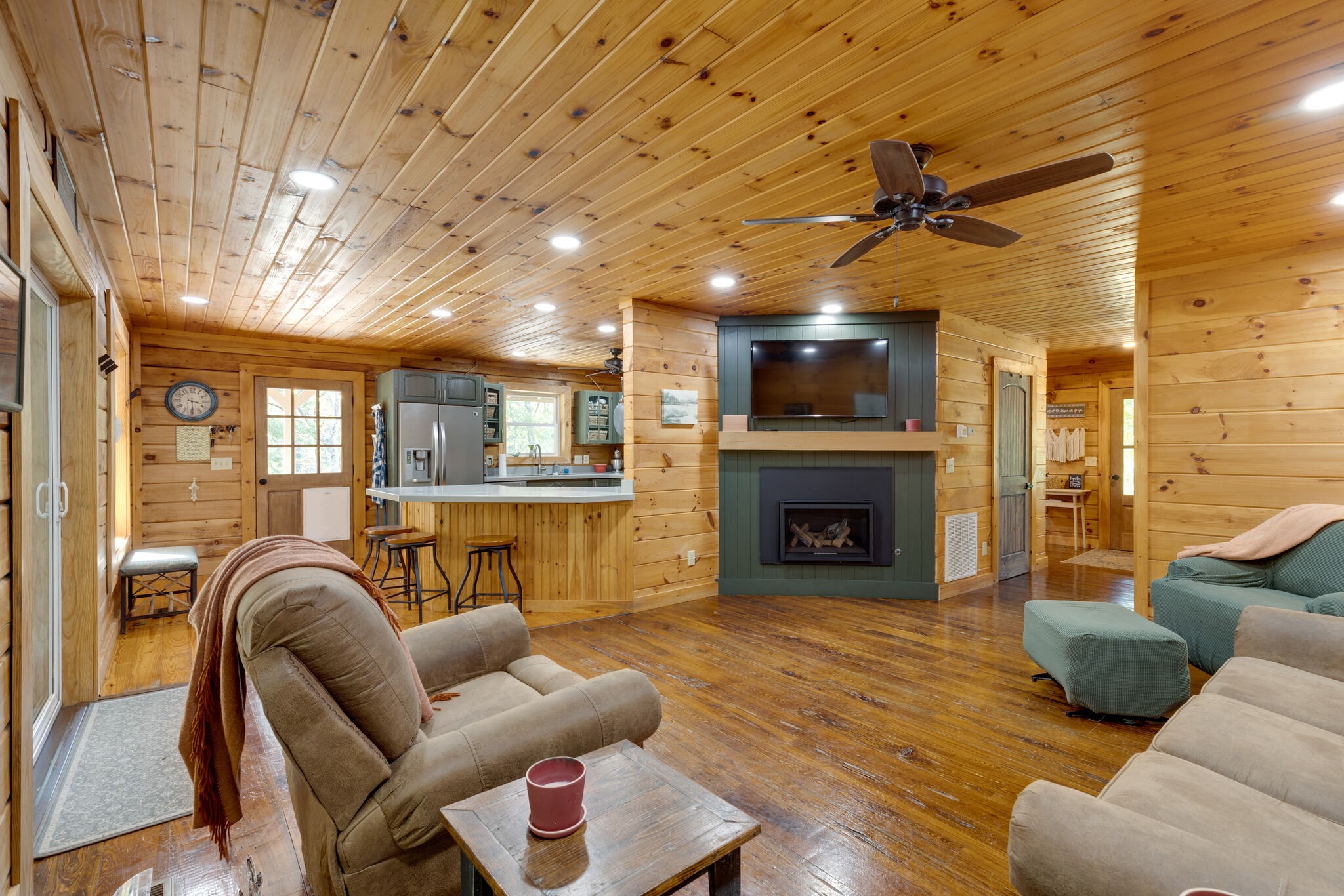 4520 Dugger Road Culleoka, TN 38451 - Photo 20 of 40 a living room with furniture and a fireplace