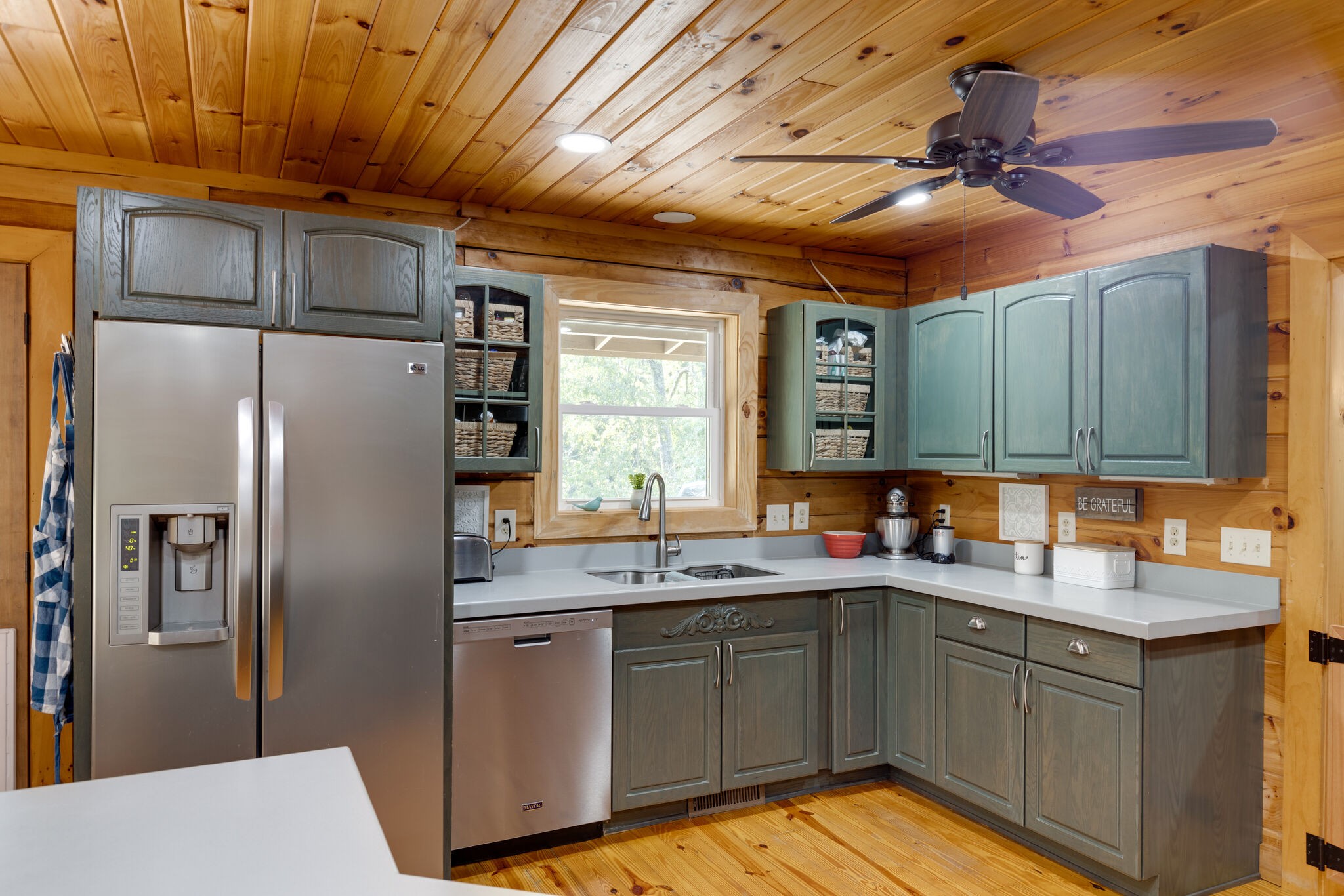 4520 Dugger Road Culleoka, TN 38451 - Photo 24 of 40 a kitchen with stainless steel appliances granite countertop a refrigerator and a sink