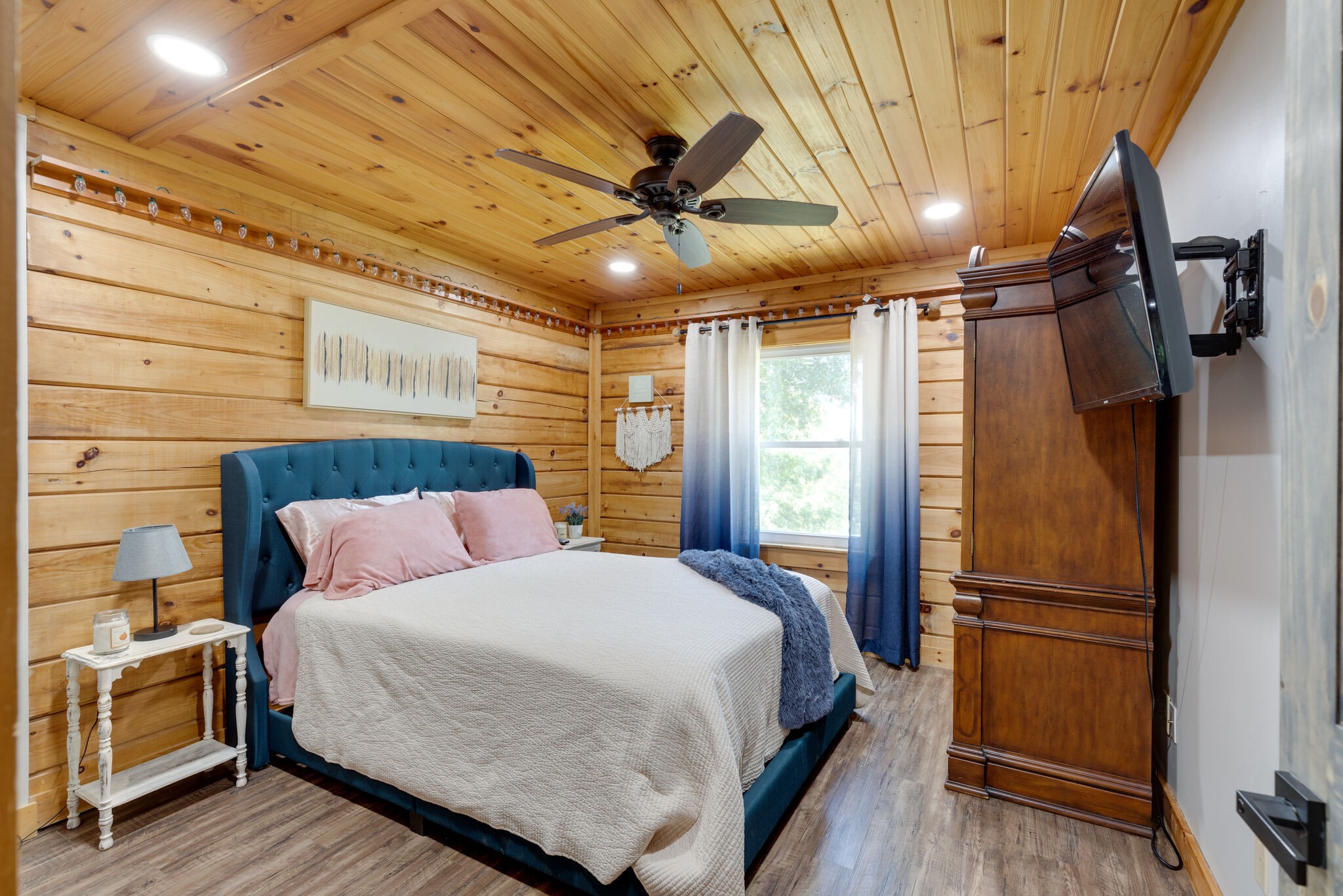 4520 Dugger Road Culleoka, TN 38451 - Photo 27 of 40 a bed room with a bed and a ceiling fan