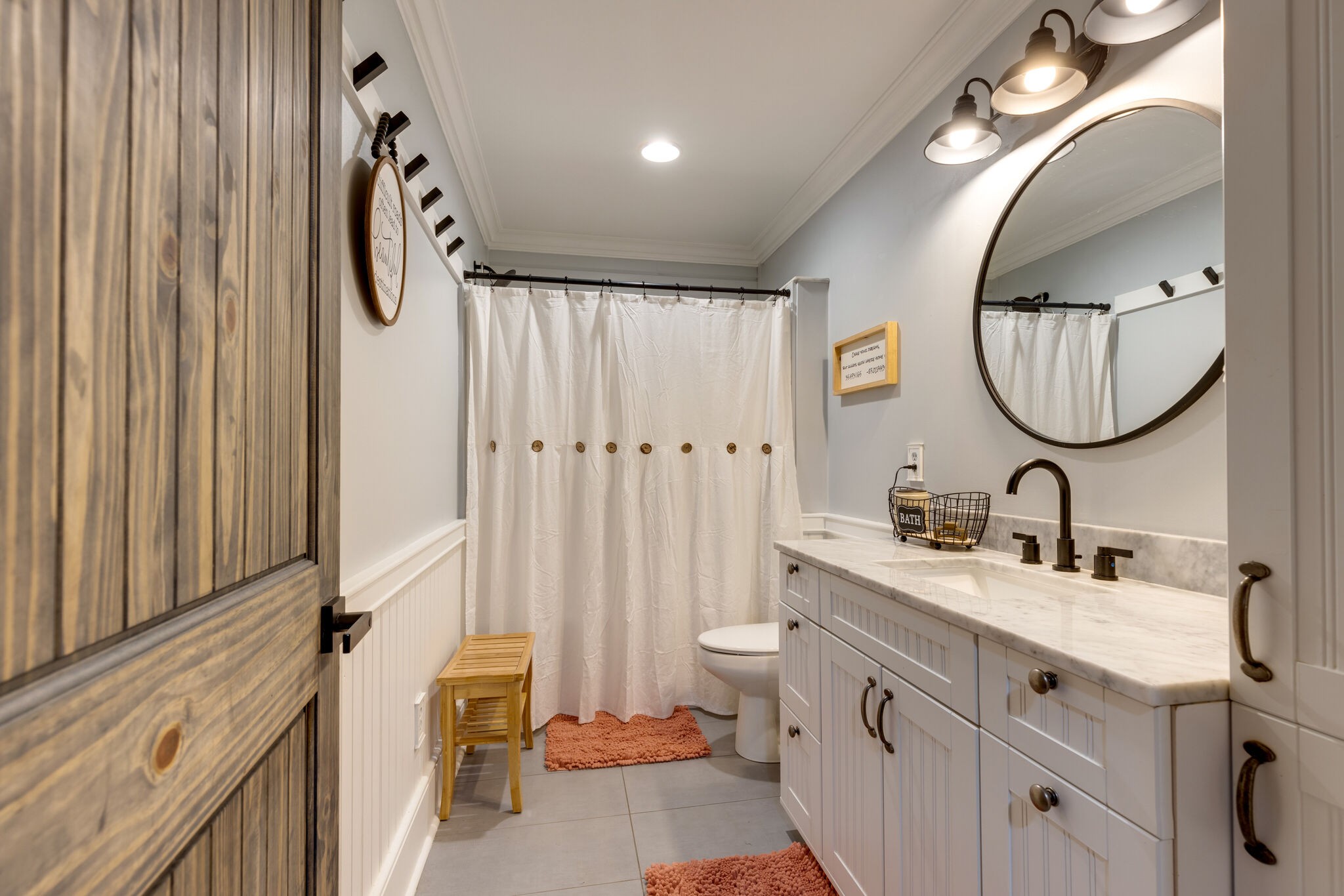 4520 Dugger Road Culleoka, TN 38451 - Photo 30 of 40 a bathroom with a sink and a mirror