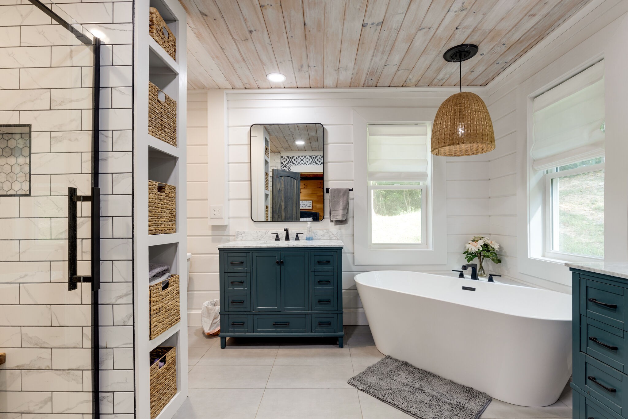 4520 Dugger Road Culleoka, TN 38451 - Photo 33 of 40 a bathroom with a double vanity sink mirror and bathtub