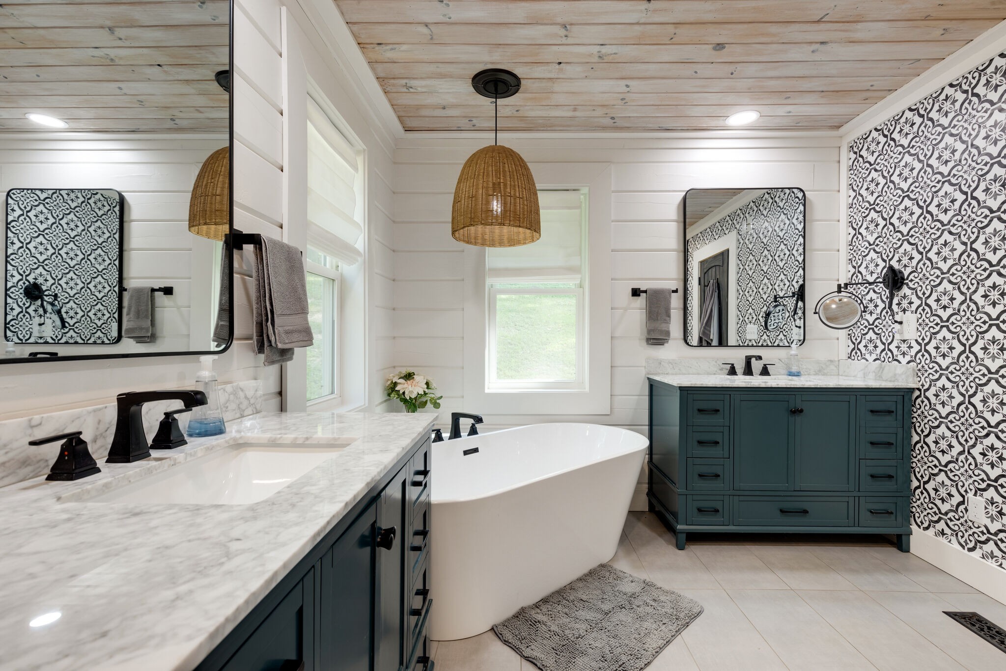 4520 Dugger Road Culleoka, TN 38451 - Photo 35 of 40 a bathroom with a double vanity sink mirror and bathtub