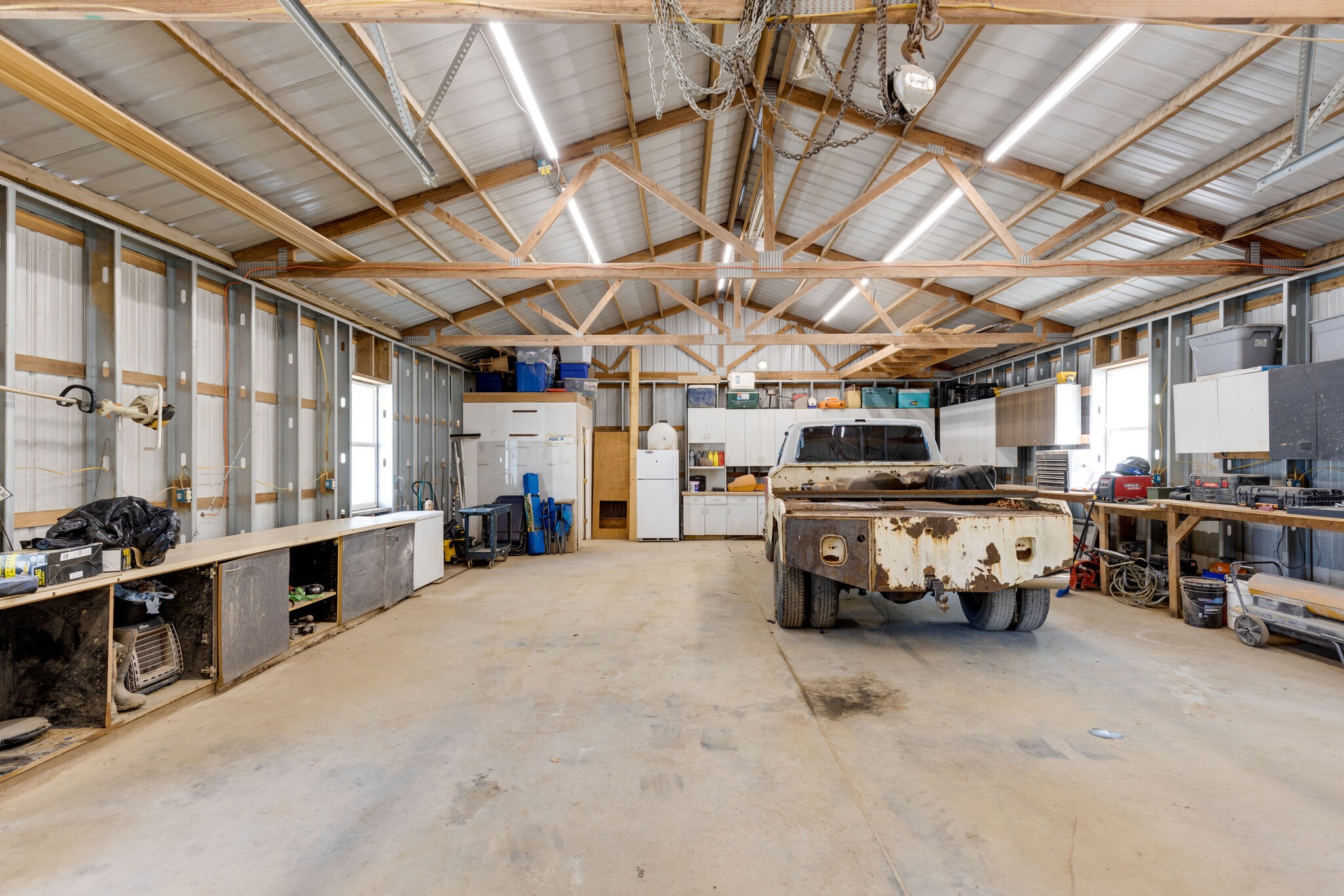 4520 Dugger Road Culleoka, TN 38451 - Photo 40 of 40 a car is parked in a garage