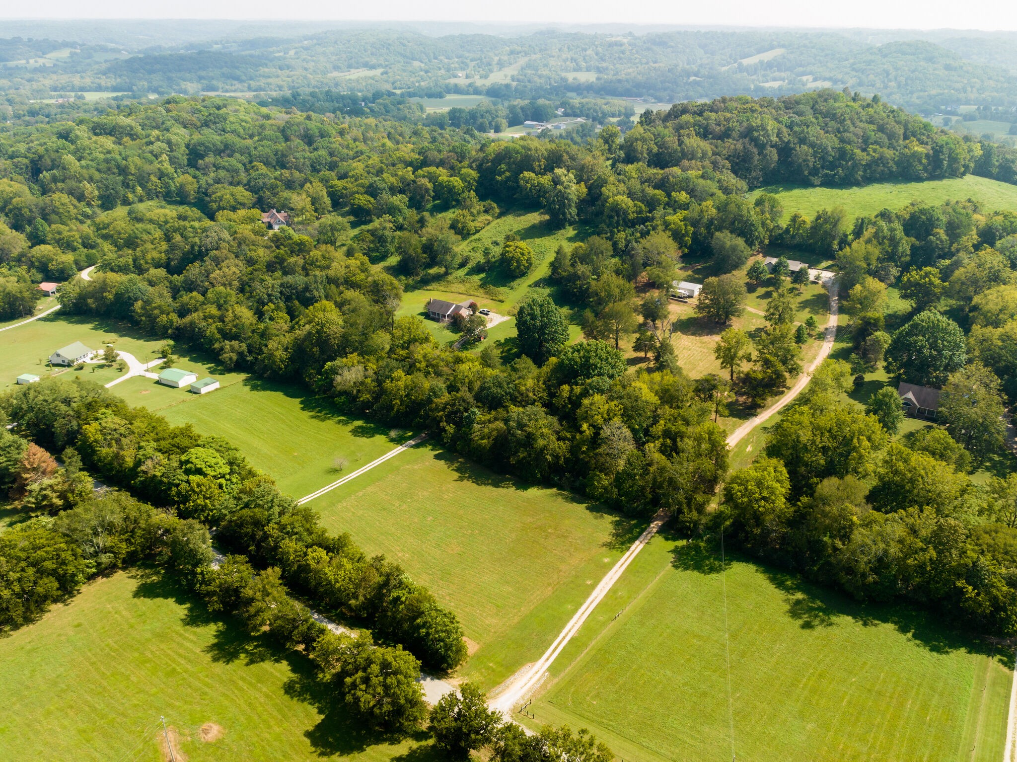 4520 Dugger Road Culleoka, TN 38451 - Photo 6 of 40 an aerial view of residential houses with outdoor space