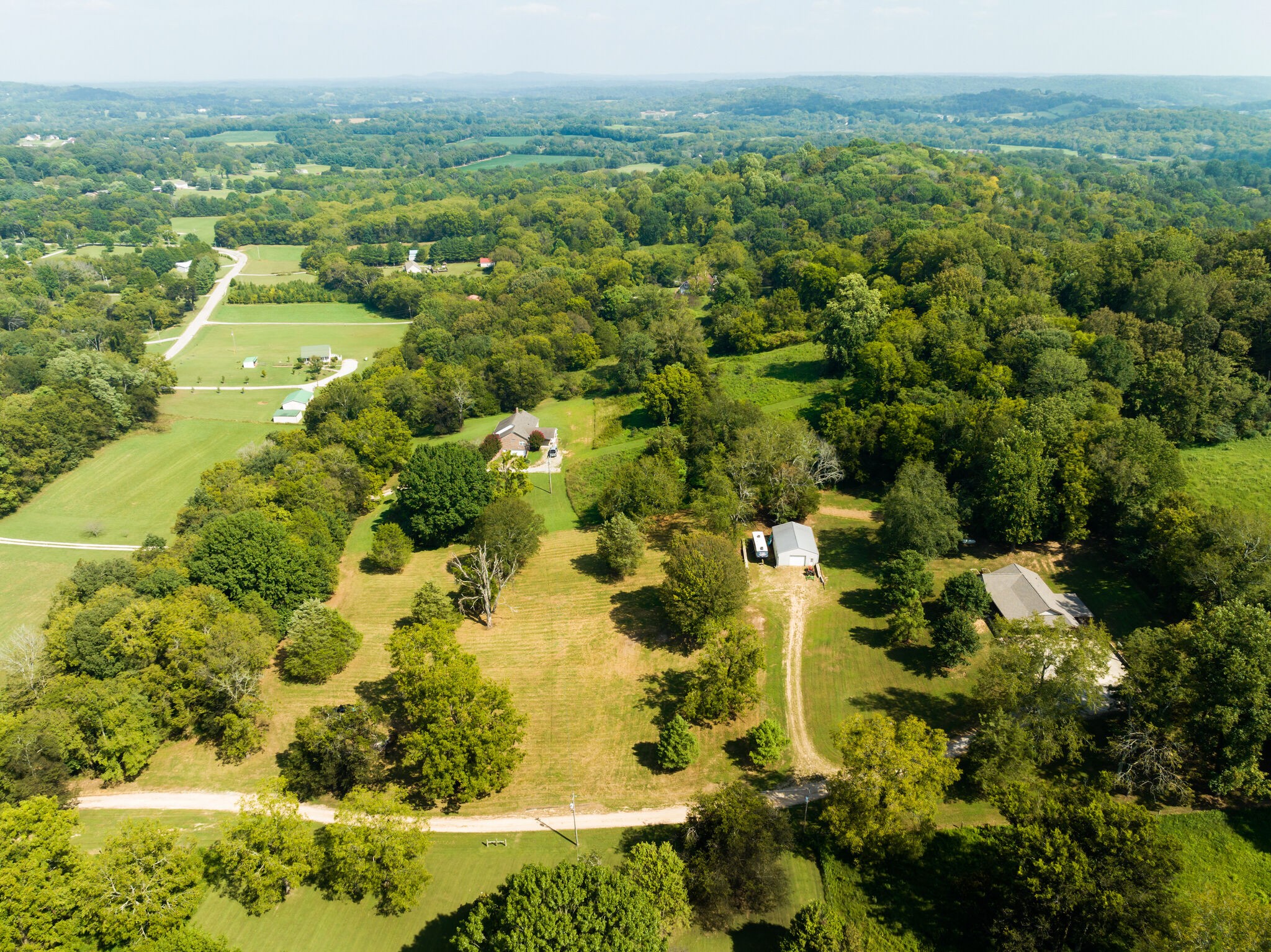 4520 Dugger Road Culleoka, TN 38451 - Photo 7 of 40 an aerial view of residential houses with outdoor space