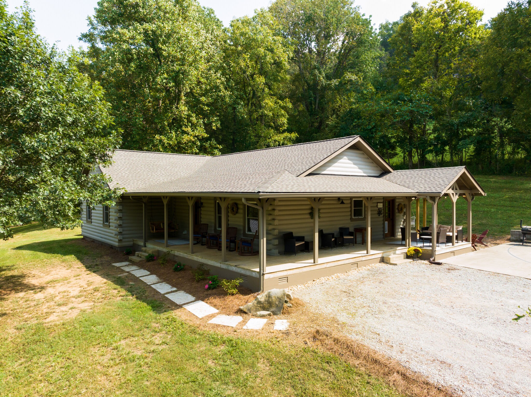 4520 Dugger Road Culleoka, TN 38451 - Photo 9 of 40 a front view of a house with a patio