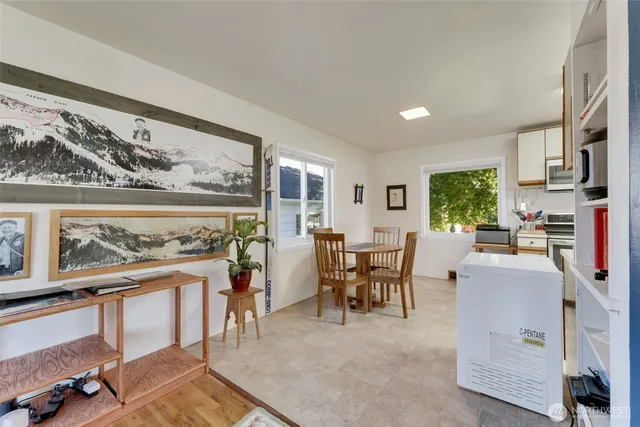 a kitchen with granite countertop cabinets and refrigerator