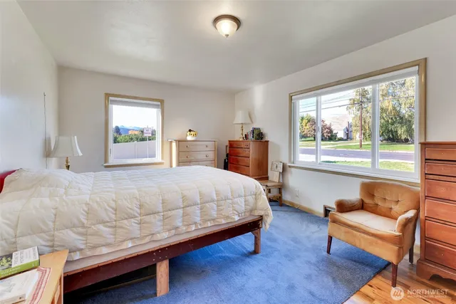 a bed room with a bed and a couch