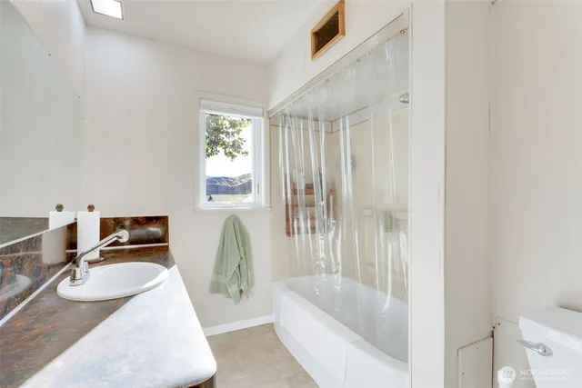 a view of a storage room with washer and dryer