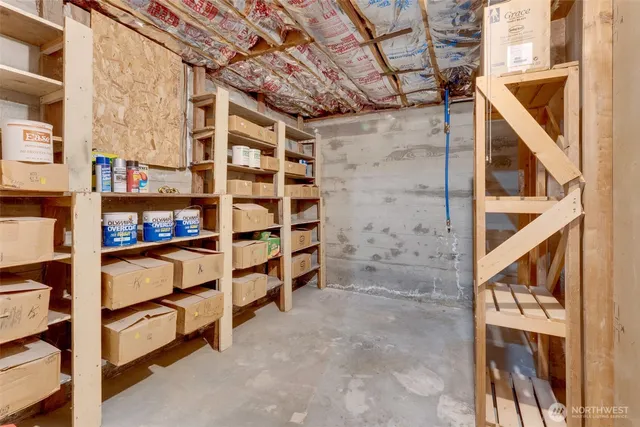 a blue bench sitting in front of a door