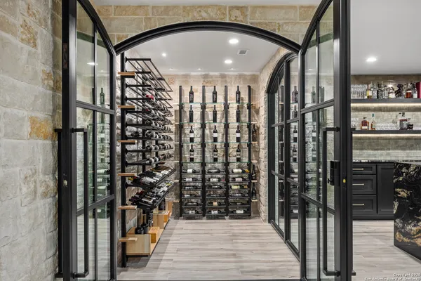 a vase of flowers sitting on a roof