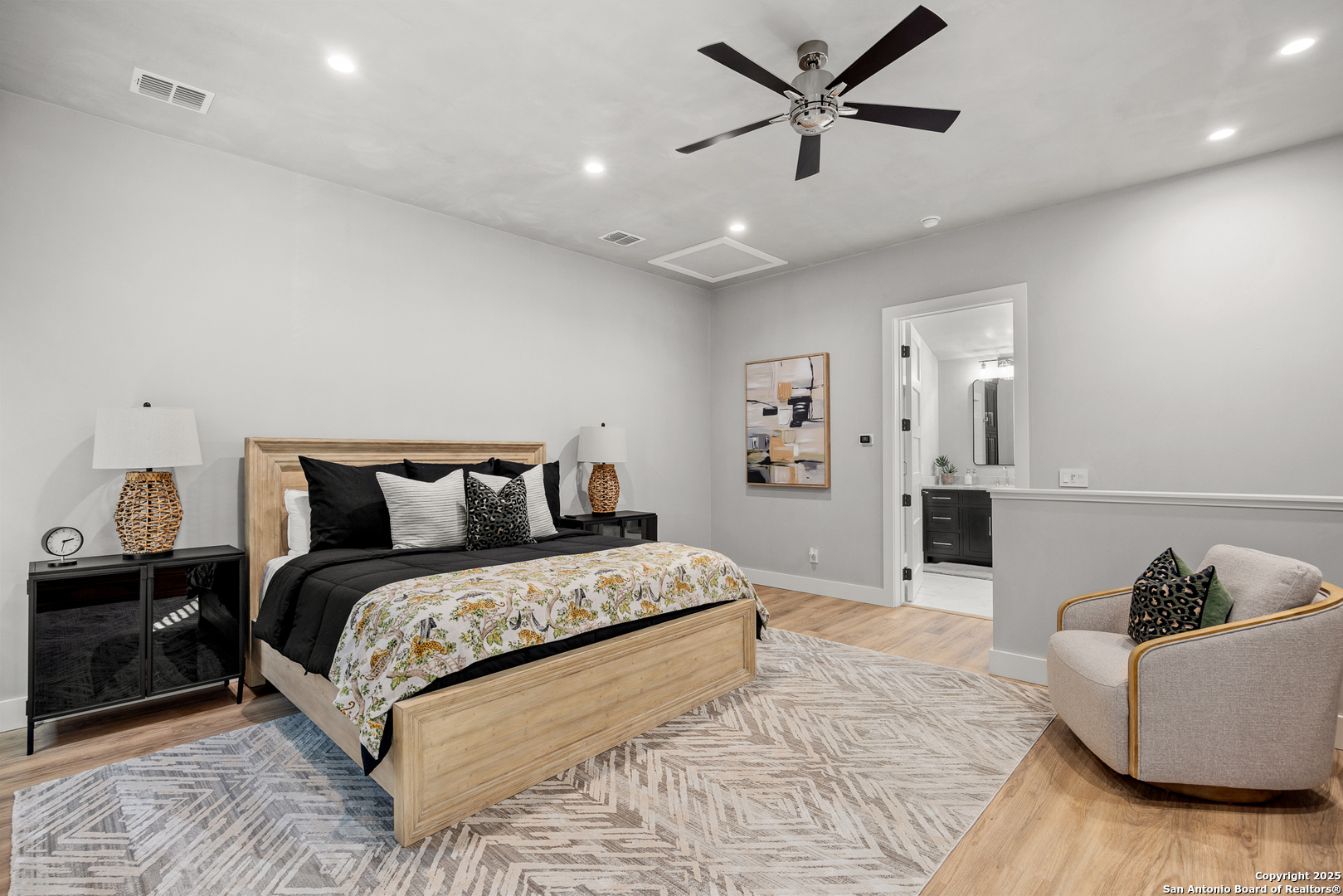 3280 Highway 39 Hunt, TX 78024 - Photo 23 of 50 a spacious bedroom with a bed and a couch