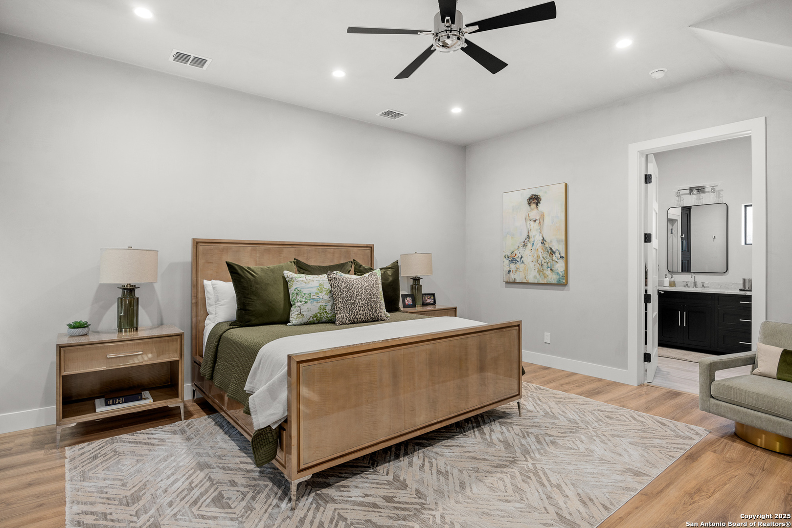 3280 Highway 39 Hunt, TX 78024 - Photo 25 of 50 a bedroom with a bed and a chandelier