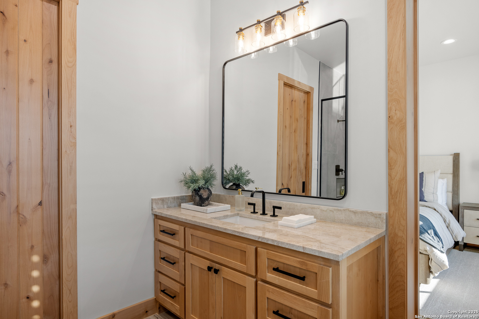 3280 Highway 39 Hunt, TX 78024 - Photo 27 of 50 a bathroom with a sink and a mirror