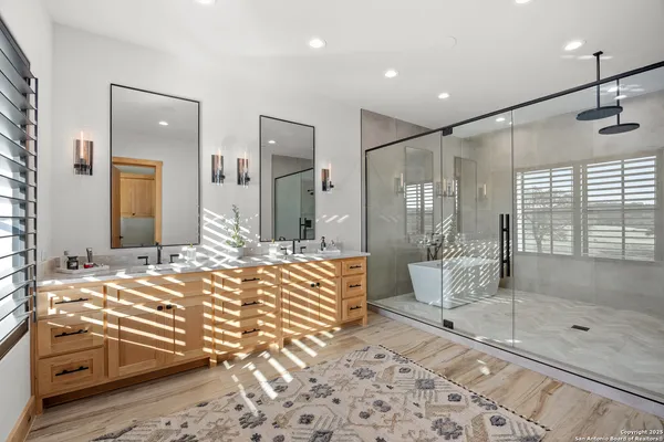 a bedroom with a bed and a fireplace