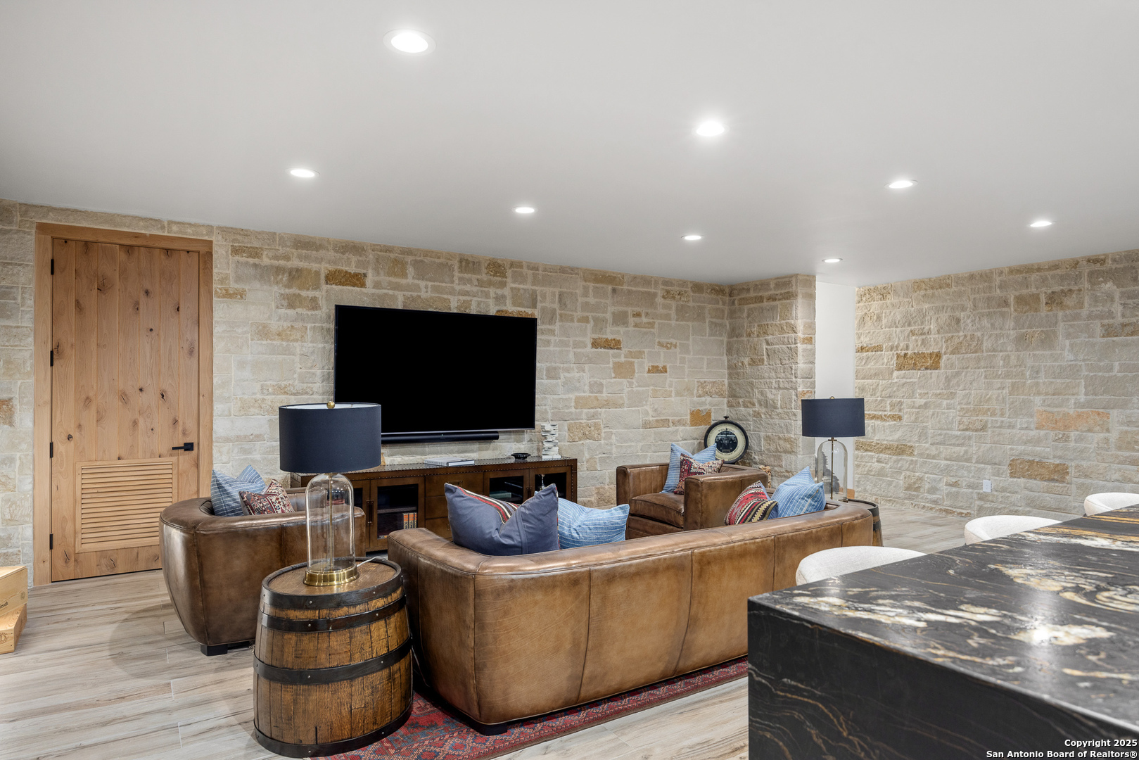 3280 Highway 39 Hunt, TX 78024 - Photo 36 of 50 a living room with furniture and a flat screen tv
