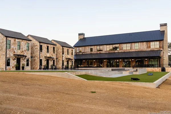 a view of swimming pool with seating space