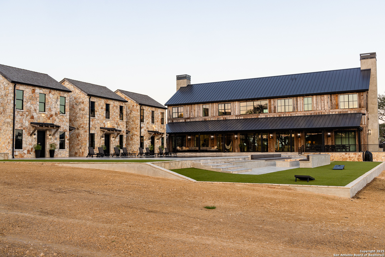 3280 Highway 39 Hunt, TX 78024 - Photo 10 of 50 a front view of a large building with swimming pool