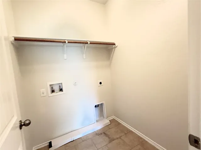 a picture of a building with a white wall