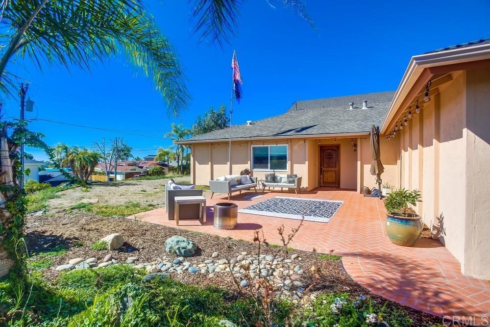 328 Hilmen Drive Solana Beach, CA 92075 - Photo 2 of 19 a view of a house with backyard and sitting area