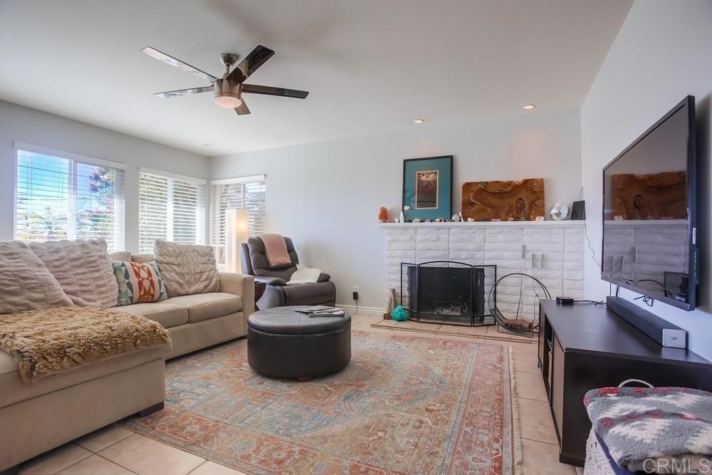 328 Hilmen Drive Solana Beach, CA 92075 - Photo 8 of 19 a living room with furniture and a fireplace